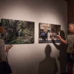 guests discussing photograph
