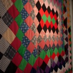 Angled detail photo of colorful quilt