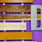 Frontal photo of "Studio D" sign