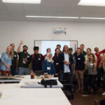 Group photo of students with Chris Bruning
