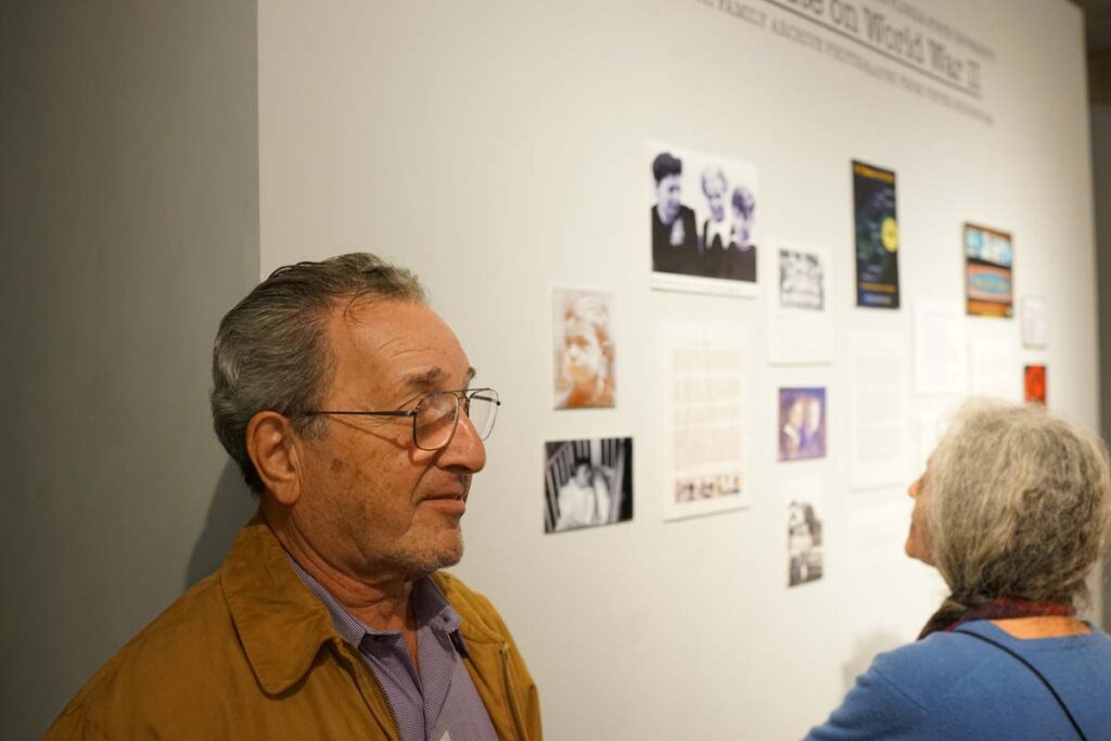 Pieter Kohnstam beside his portrait at six years old