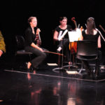 Carlson performs Grass with the FSU Eppes String Quartet
