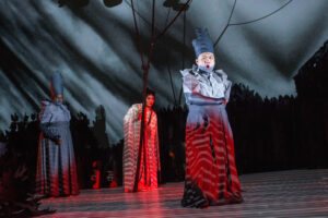 John Holiday, Qian Yi and Yi Li in a scene from “Paradise Interrupted.” Photo by: Stephanie Berger