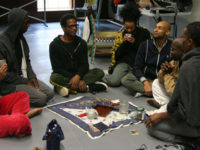 Living Legacy Artist Ralph Lemon (center) in dialogue with his collaborators during his 2010 MANCC residency for How Can You Stay All Day and Not Go Anywhere?