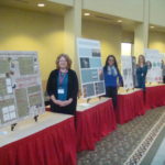 Graduate students with posters