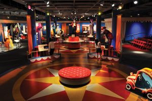 A colorful museum gallery with a circus theme.