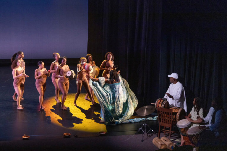 Dancing group of people on stage