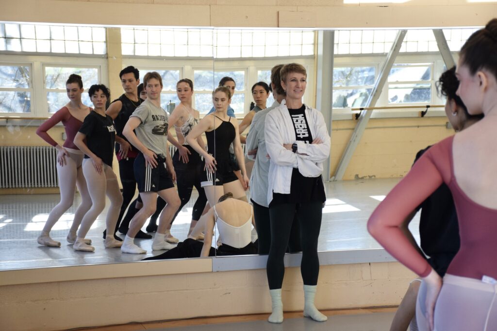 A dance class reflected in a mirror
