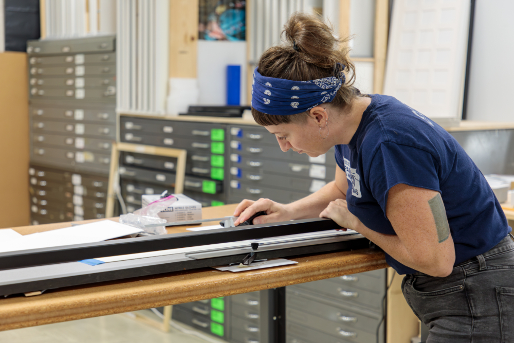 Lady cutting paper