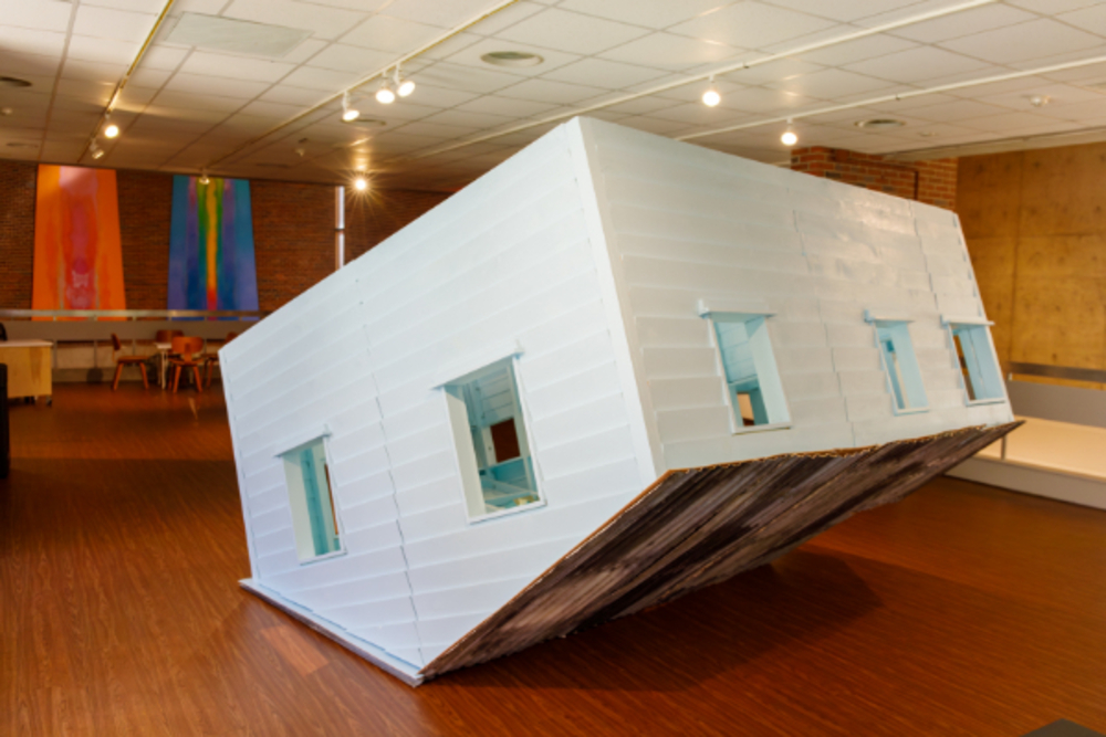 art exhibit of a upside down house