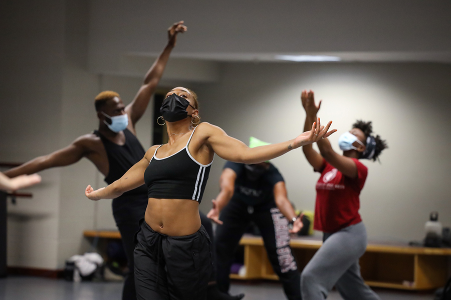 McIntyre dancer Kamryn Vaulx and FSU dance students Taylor West and Sherrod Reid rehearse “In the Same Tongue” during McIntyre MANCC residency. (Chris Cameron)