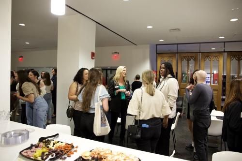 Alumni, students and friends gathered for a reception in WJB. 